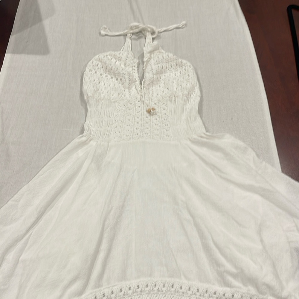 B1272 Bohemian dress. Center stretches, back is longer than the front